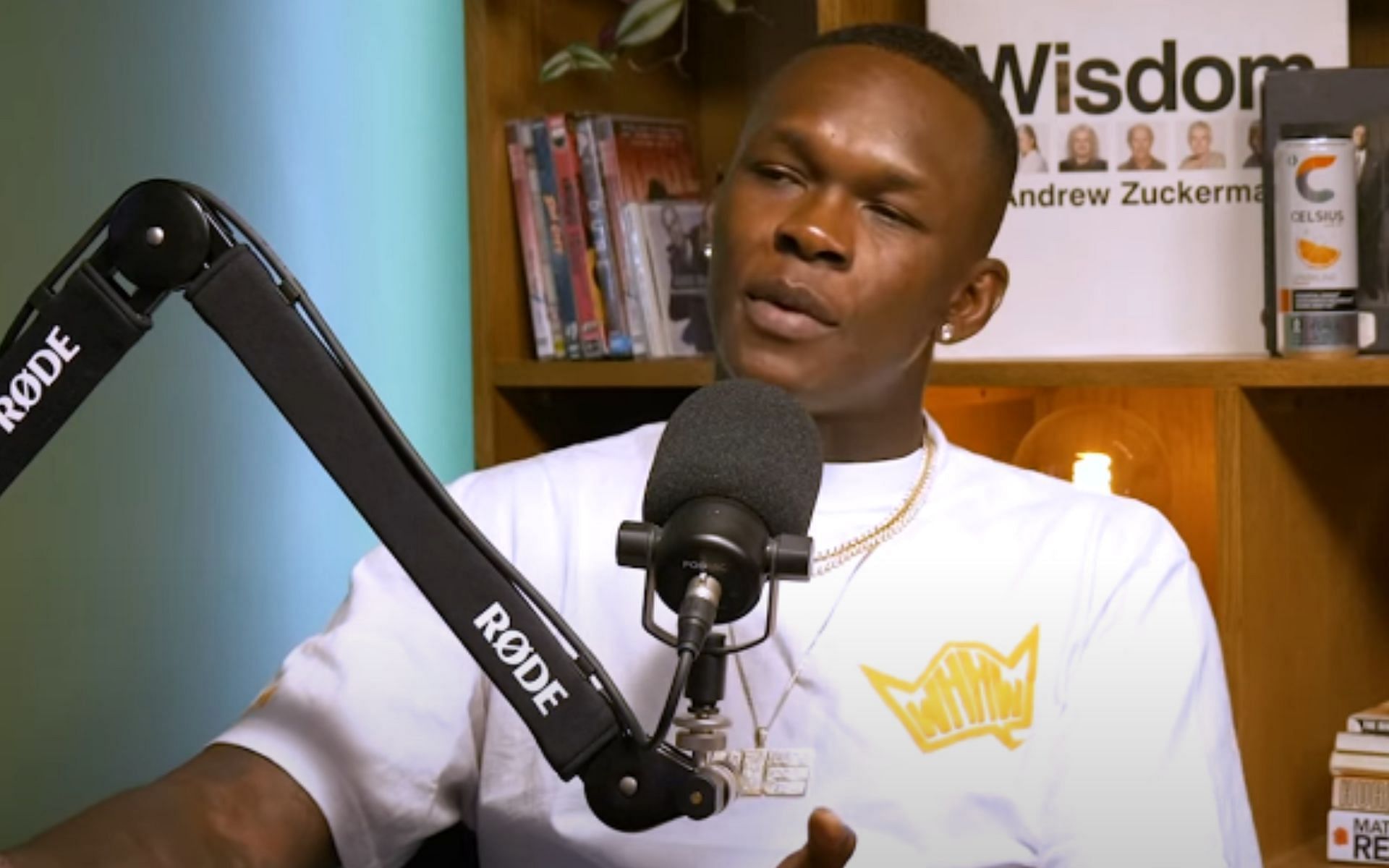 Israel Adesanya talks about how he is grateful that he found fame after he was matured [Image courtesy: Theo Von - YouTube]