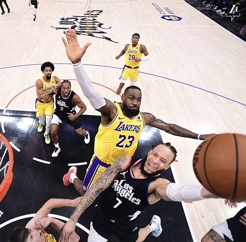 ELA Lakers forward LeBron James blocks LA Clippers forward Amir Coffey