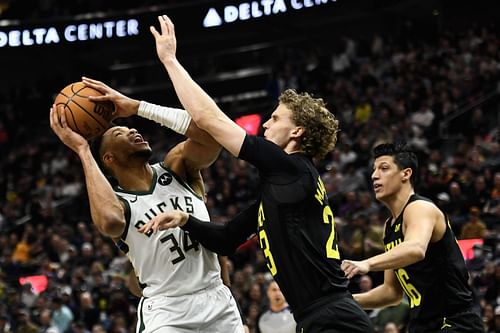 Milwaukee Bucks superstar forward Giannis Antetokounmpo (left)