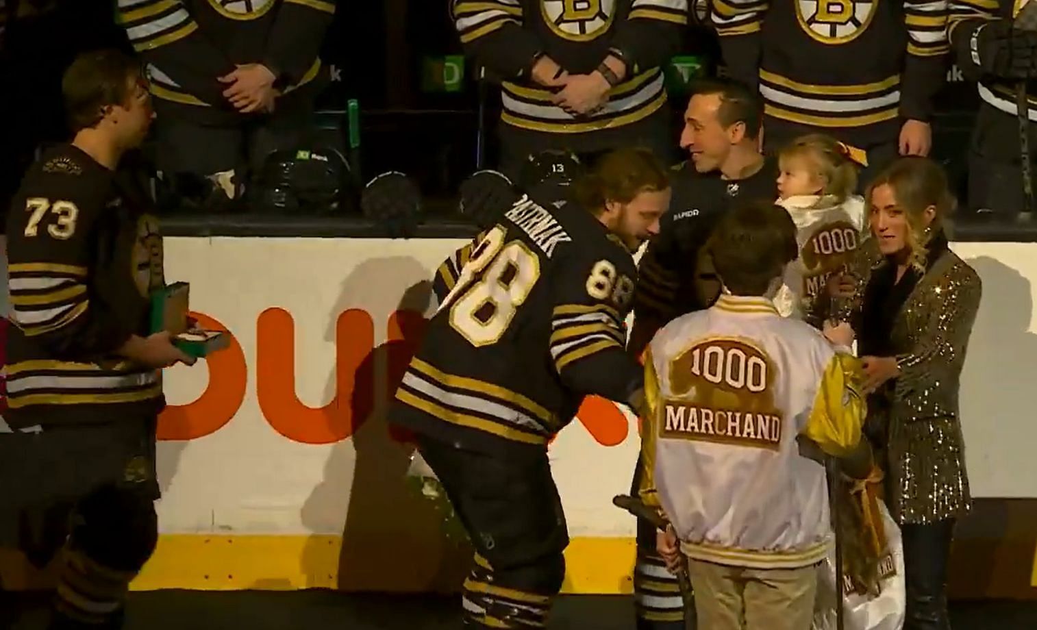 NHL fans react as Bruins celebrate Brad Marchand hitting 1,000 game milestone