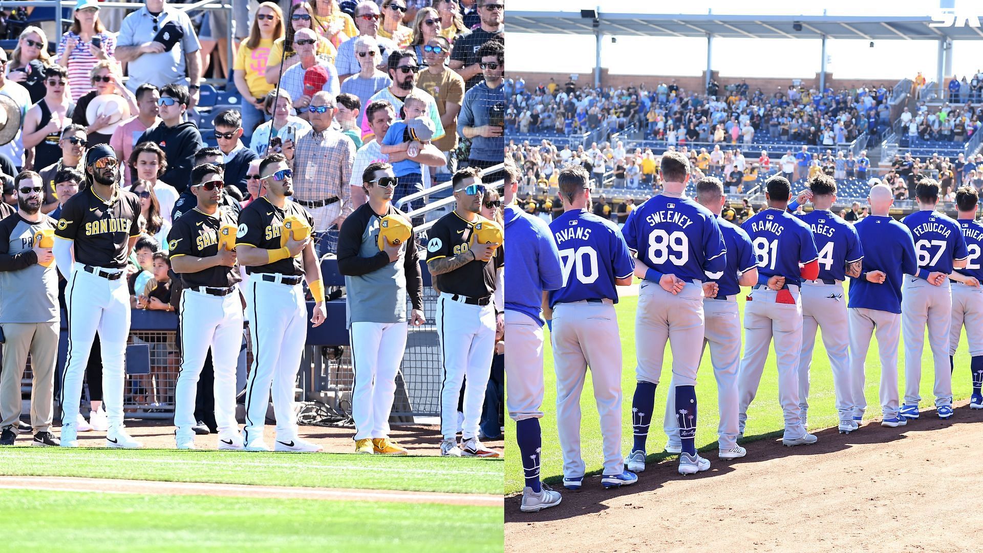 The Los Angeles Dodgers and the San Diego Padres stand during the singing of the national anthem prior to a spring training game at the Peoria Sports Complex