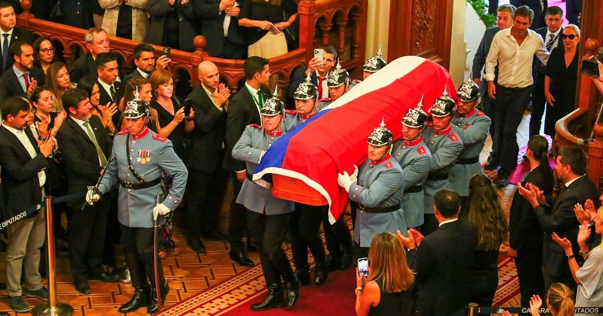The Coffin Carrying Former President Of Chile Sebastian Pi&ntilde;era Arrives To Lie In State At National Congress (Image via Getty/ Marcelo Hernandez)