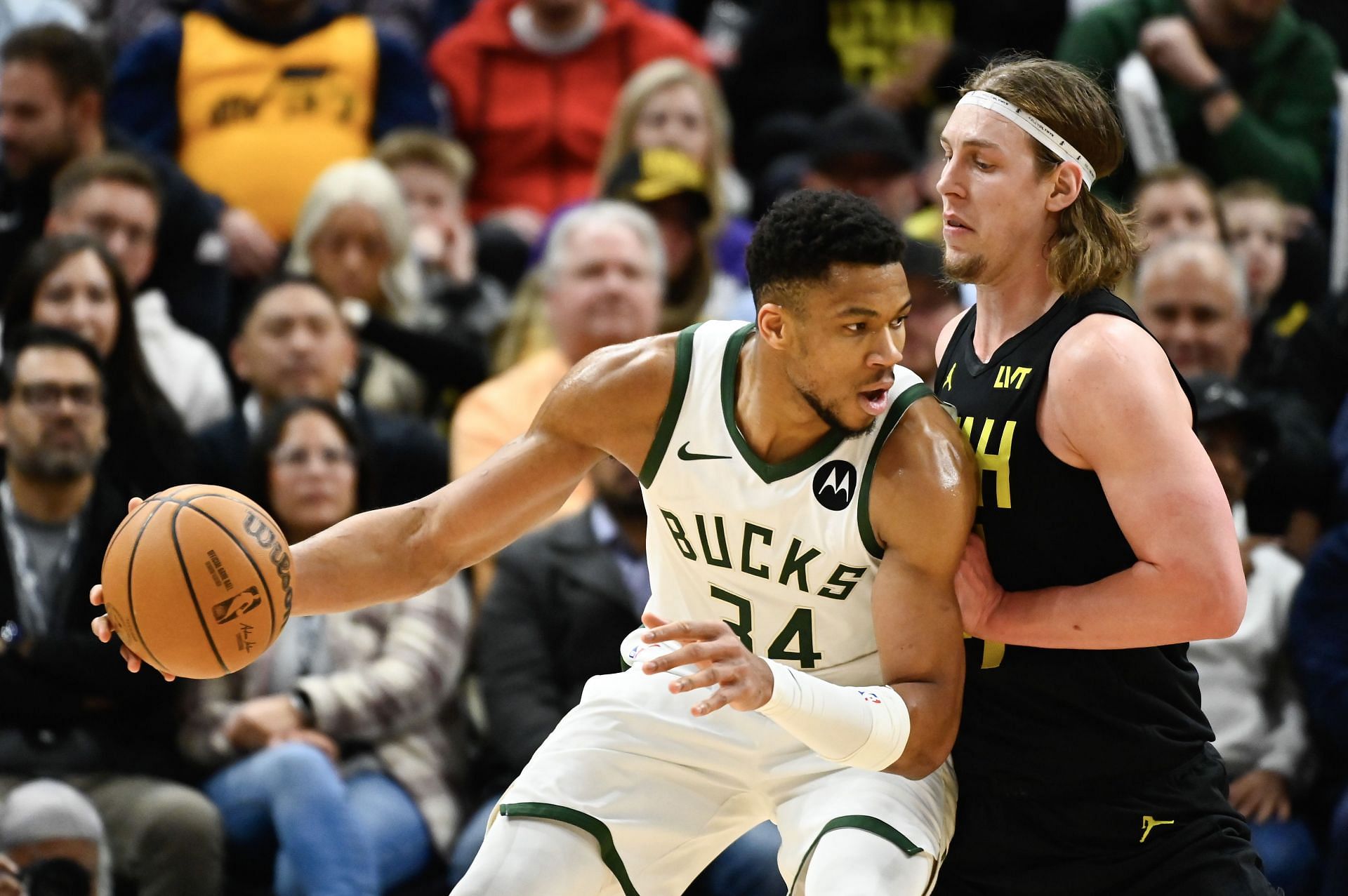 Milwaukee Bucks superstar forward Giannis Antetokounmpo (left)