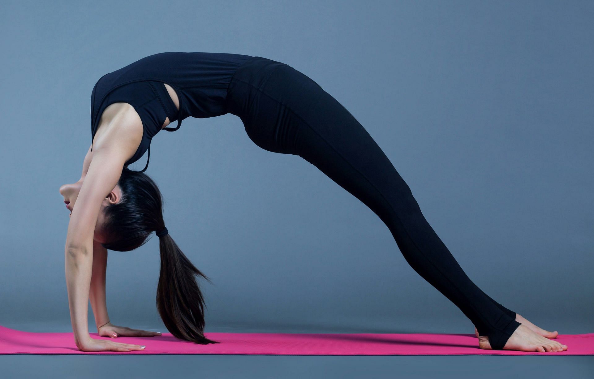 One of the top 8 stress-busting yoga poses: The bridge(Image by Alex Shaw/Unsplash)
