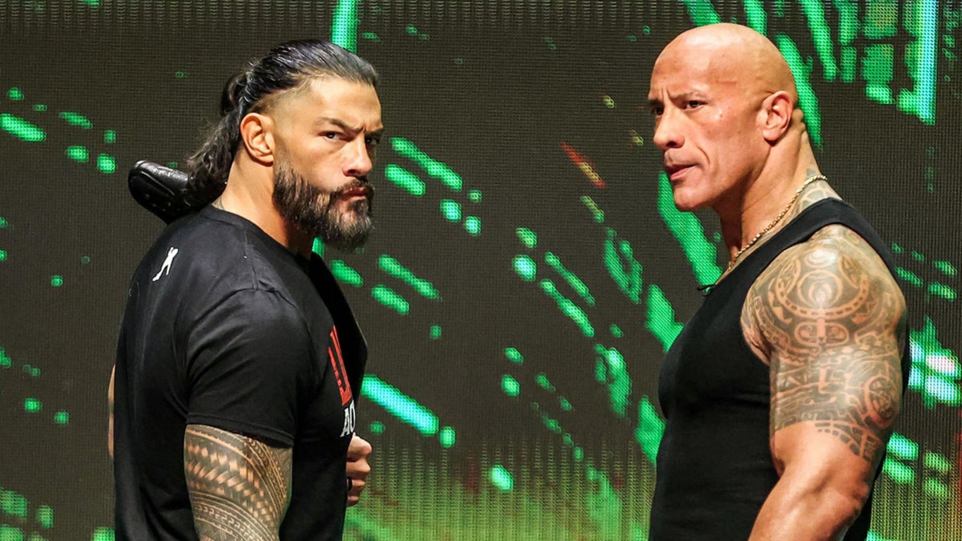 The Rock and the Undisputed WWE Universal Champion Roman Reigns