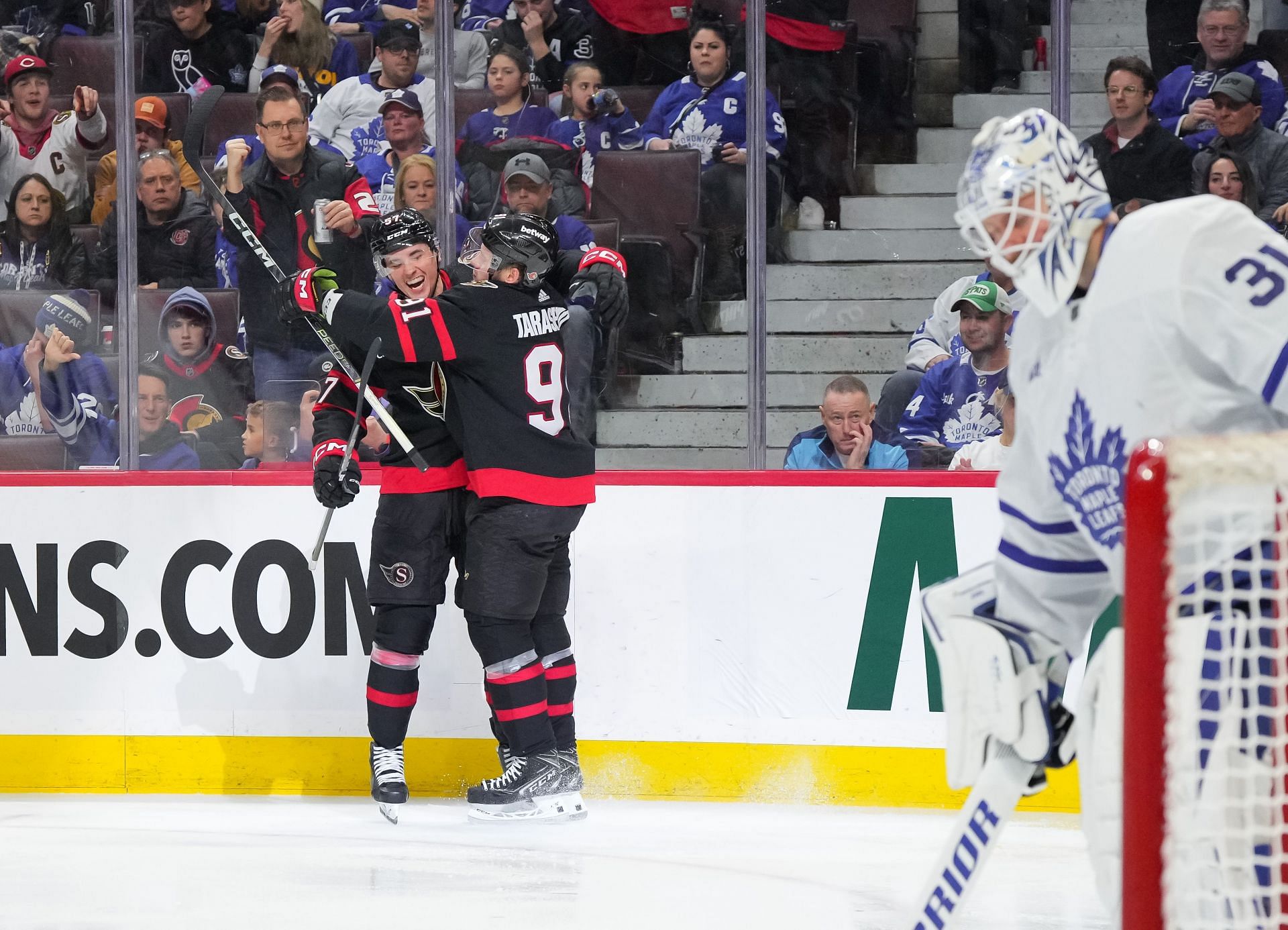 Shane Pinto and Vladimir Tarasenko celebrate a goal against the Maple Leafs.