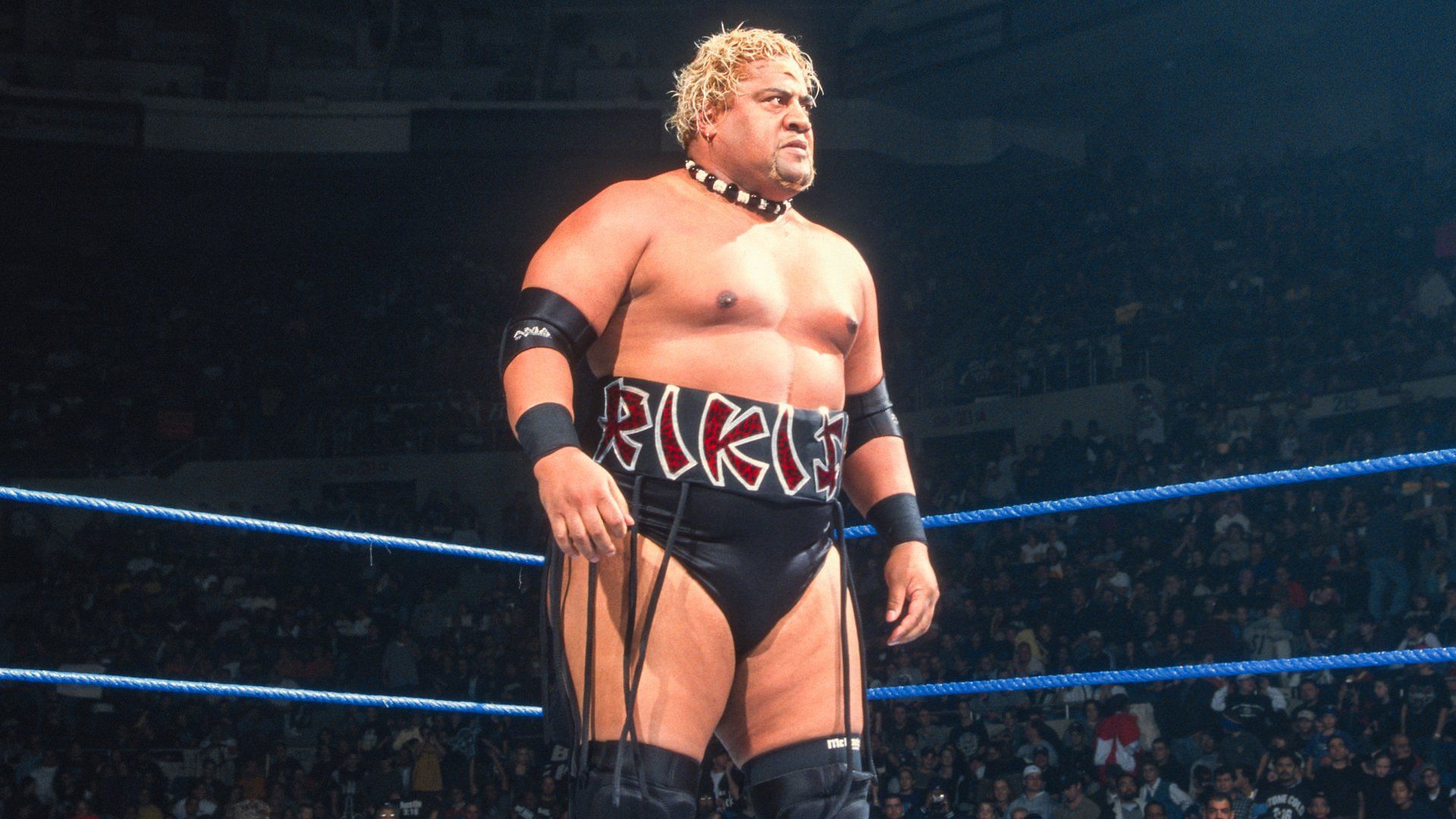 Rikishi stands tall in the WWE ring after a win