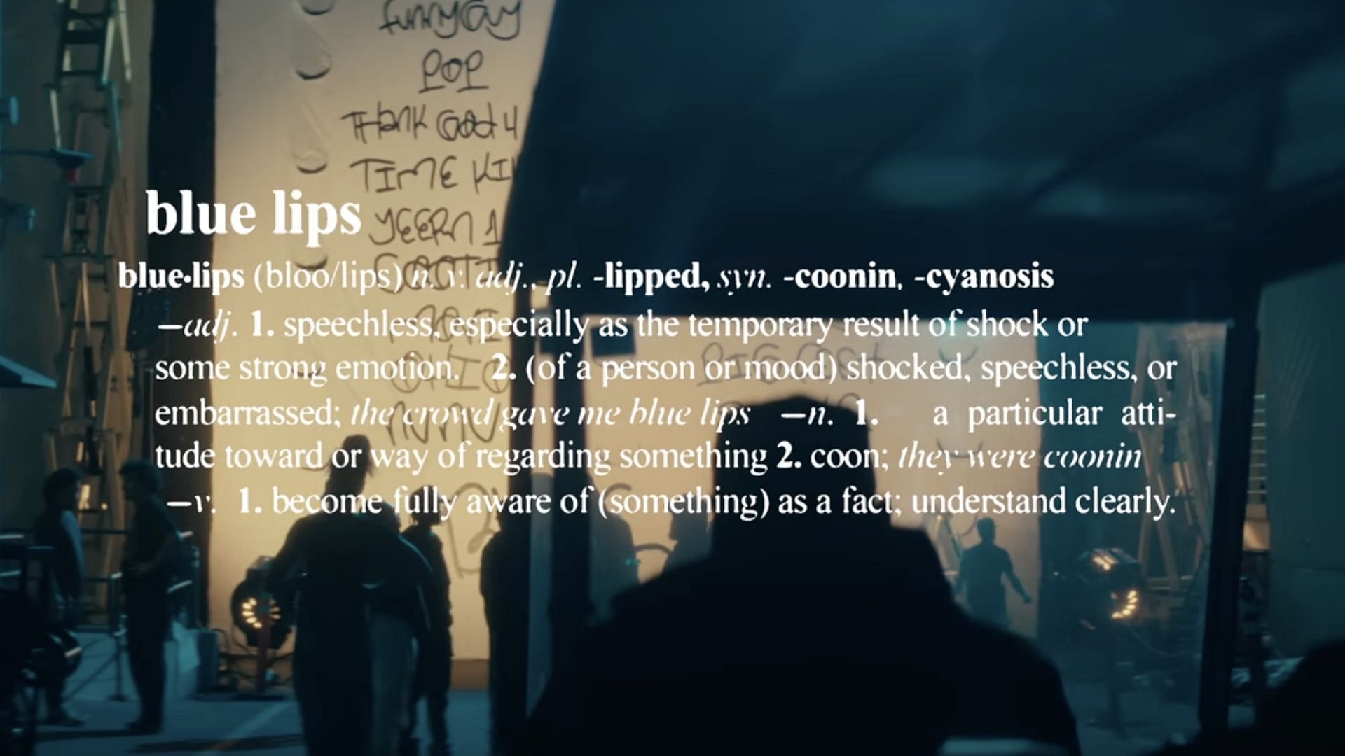 Screenshot of the Album trailer showcasing the dictionary definition for &#039;Blue Lips&#039; (Image via YouTube/@schoolboyq4975)