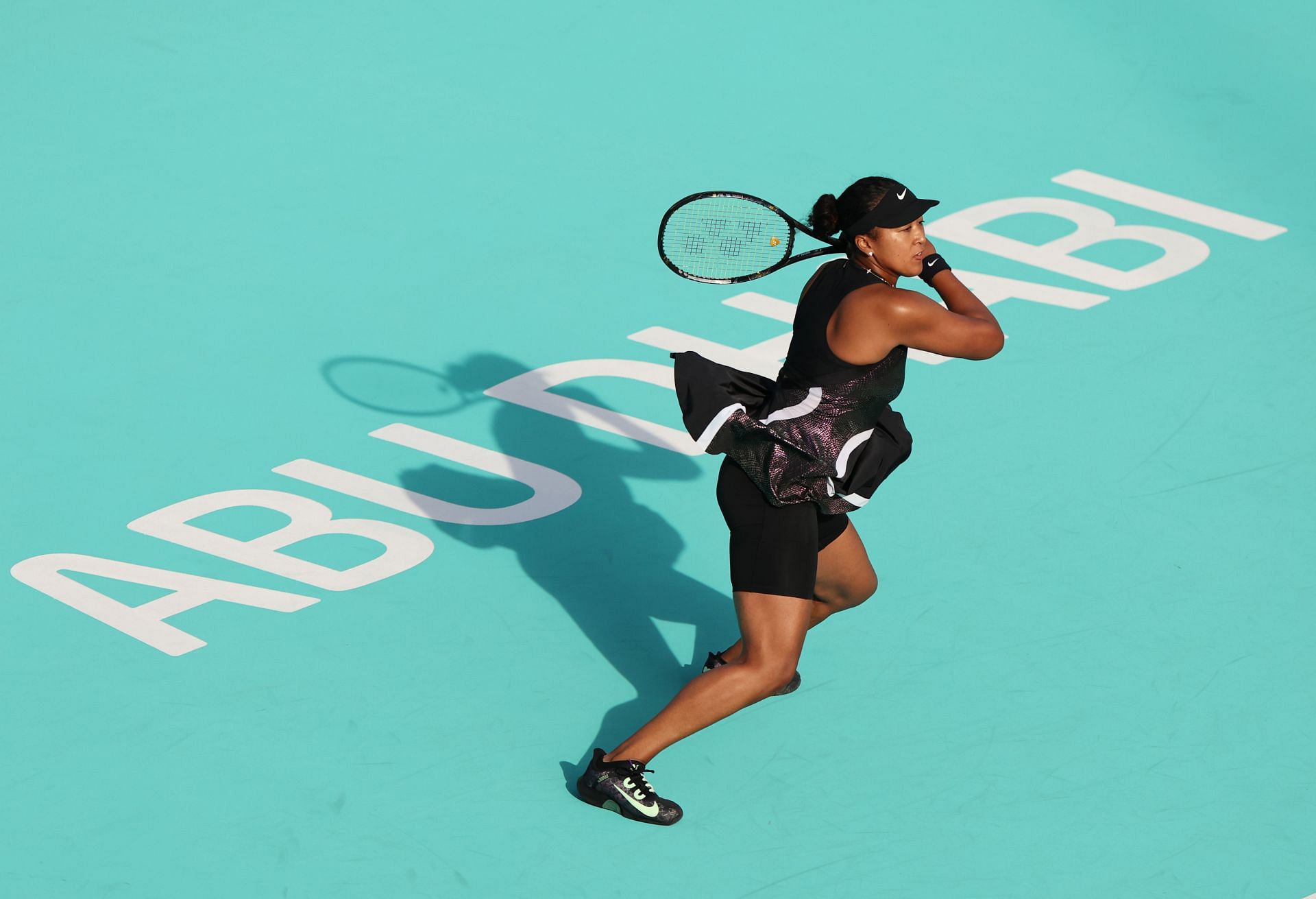 Naomi Osaka hits a forehand at the 2024 Mubadala Abu Dhabi Open