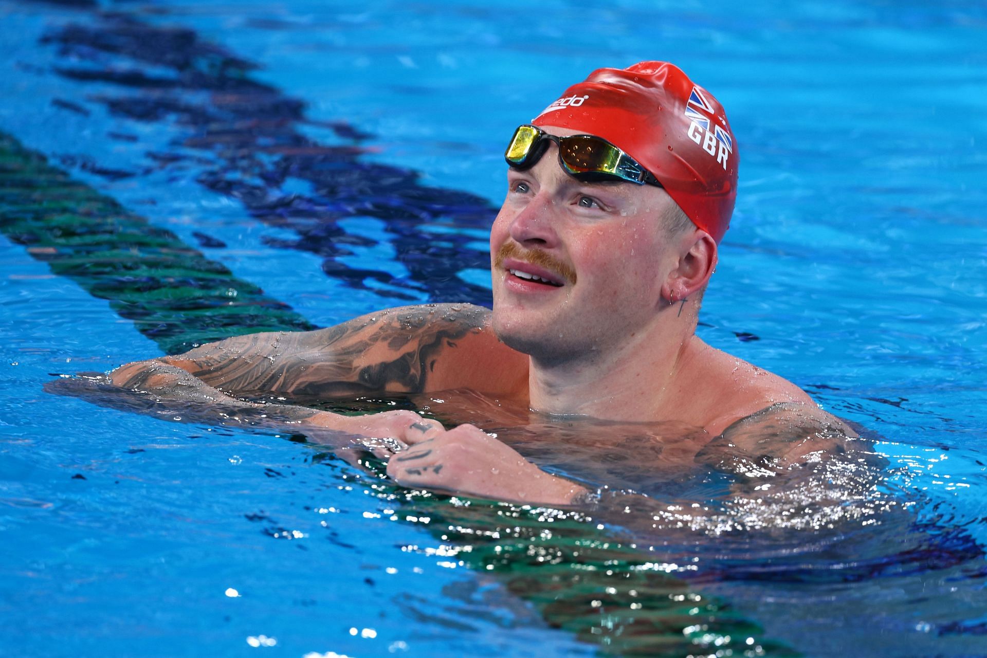 Adam Peaty will be in action in the men&#039;s 100m breaststroke at the Doha 2024 World Aquatics Championships (Photo by Clive Rose/Getty Images)