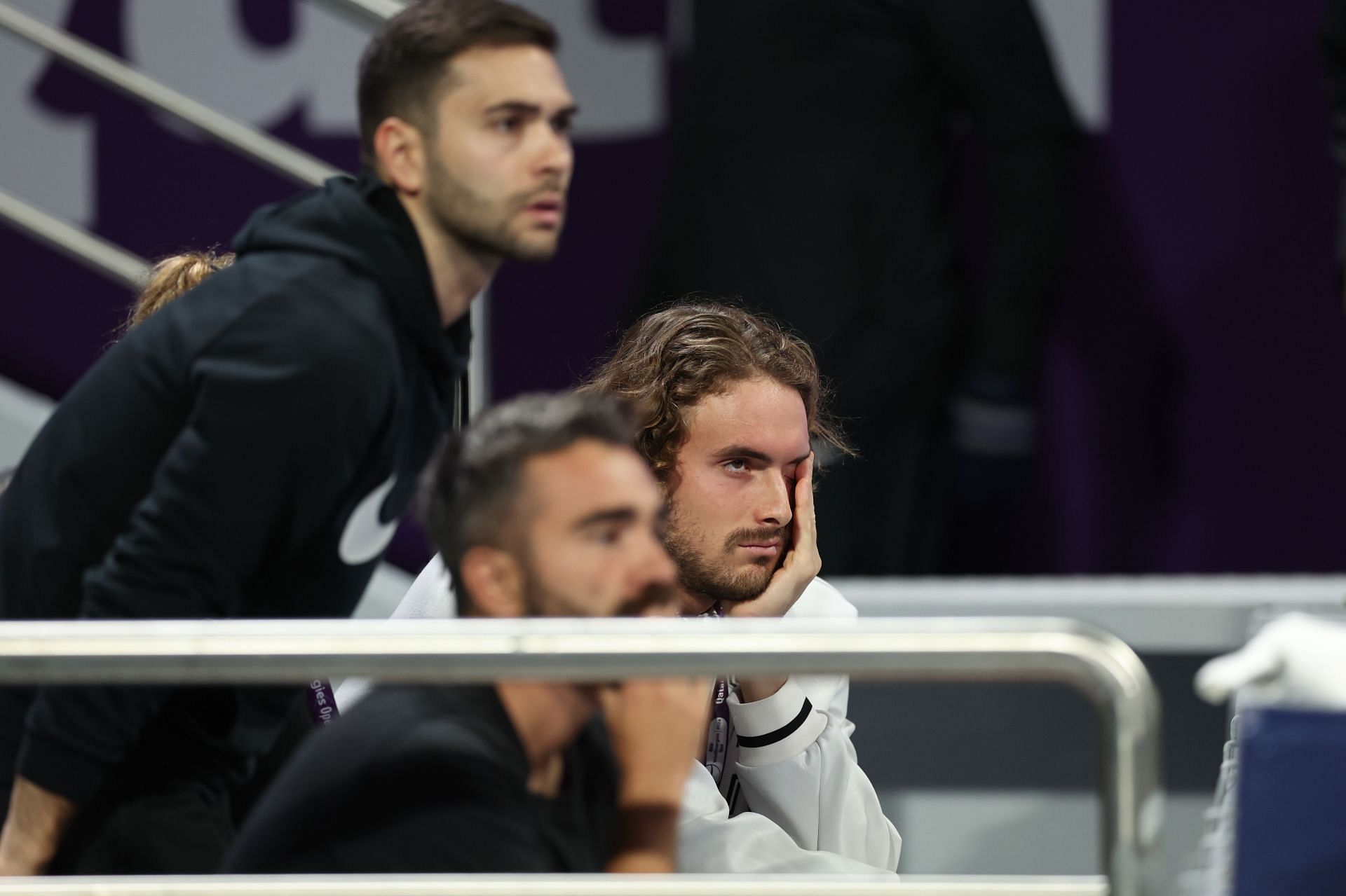 Stefanos Tsitsipas watching Paula Badosa during her first-round match at the 2024 Qatar Open.