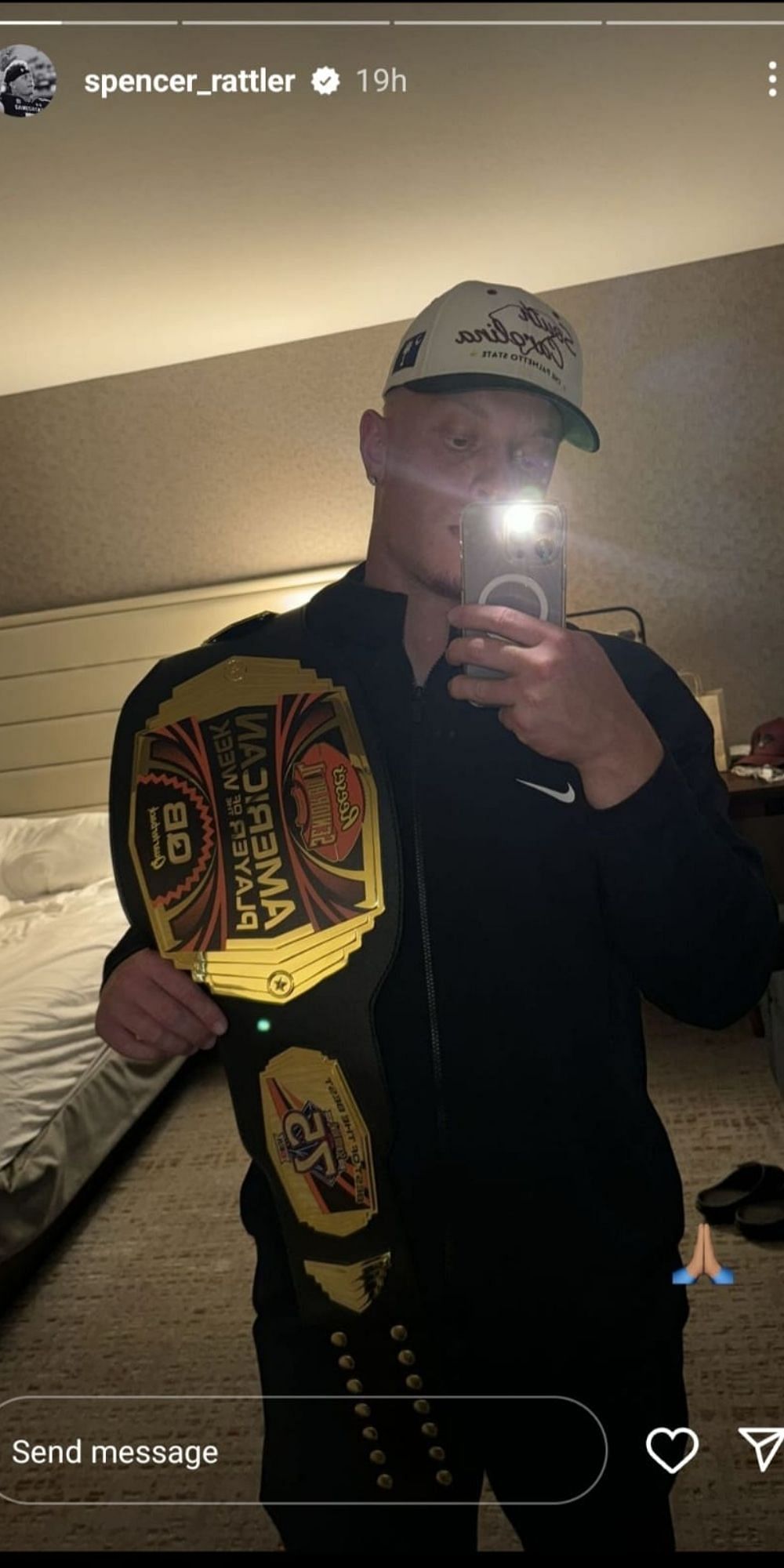 Rattler showing off the belt.