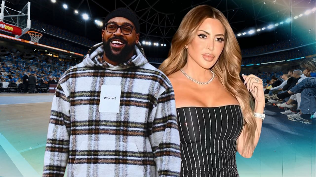Marcus Jordan addresses paparazzi as he bothers his date with Larsa Pippen