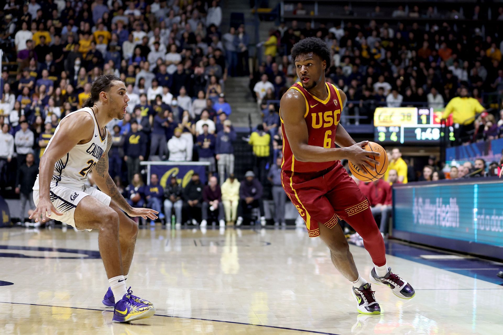 Bronny James #6 of the USC Trojans is guarded by Jaylon Tyson #20