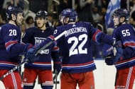 New York Rangers celebrate a goal against the Tampa Bay Lightning.