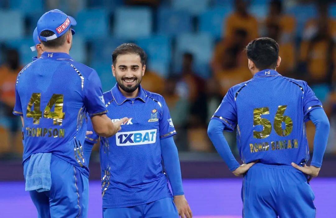 Waqar Salamkheil celebrating a wicket with his MI Emirates teammates