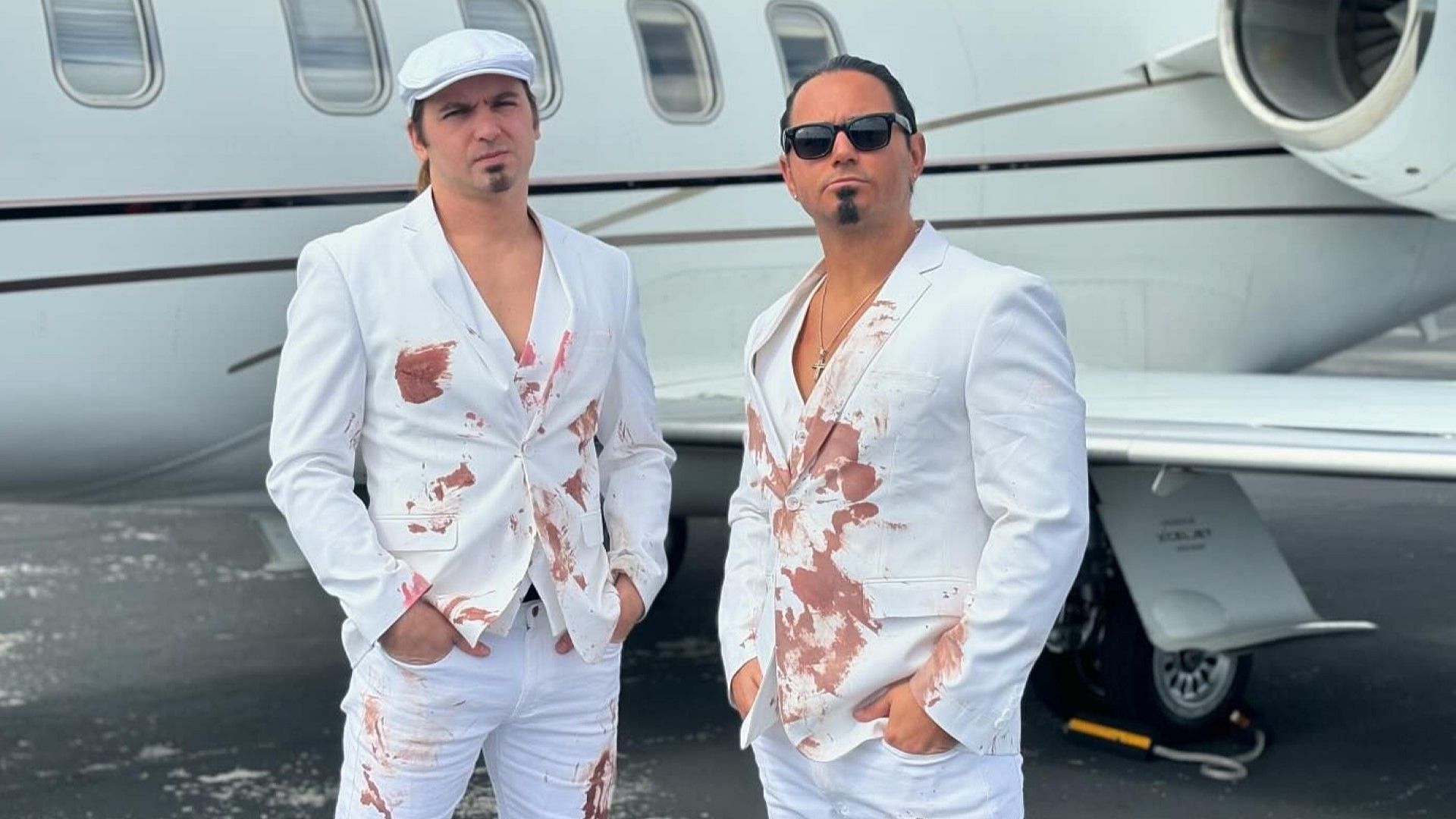 AEW Executive Vice Presidents The Young Bucks outside of the private plane
