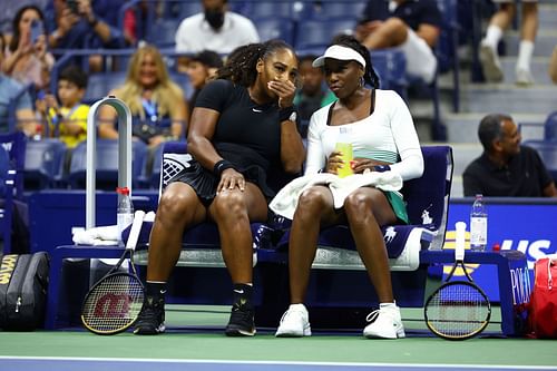 Serena Williams (L) and Venus Williams