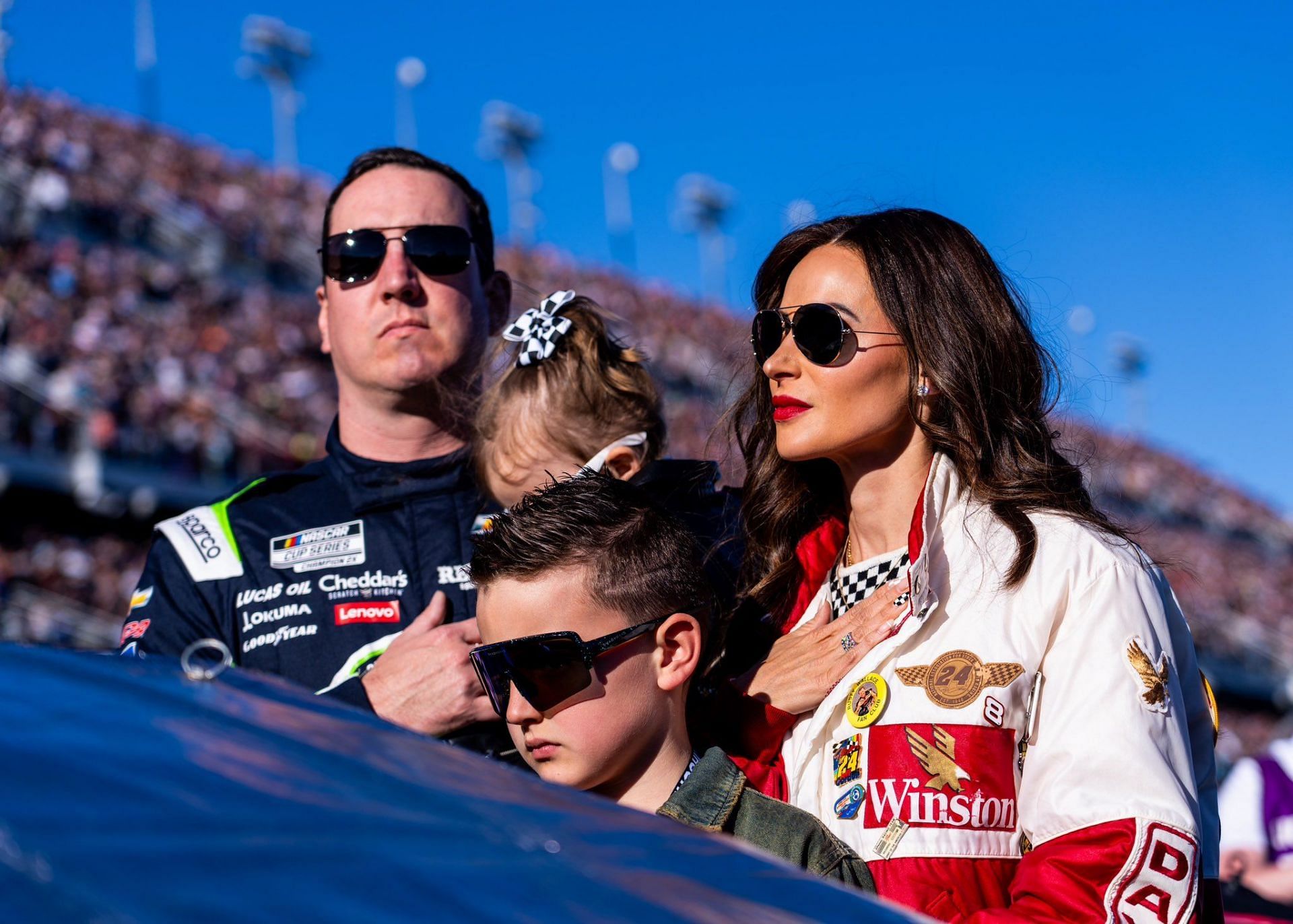 (L-R) NASCAR Cup Series driver Kyle Busch with wife Samantha Busch and children Brexton and Lennix Key Busch