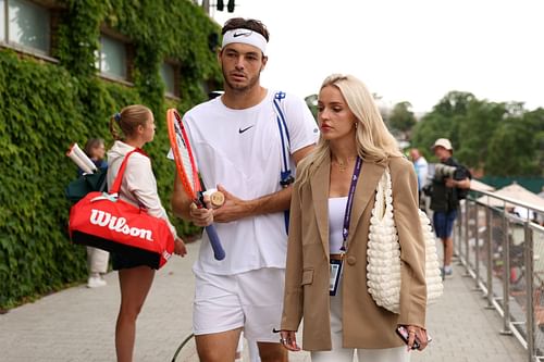 Taylor Fritz and Morgan Riddle pictured at Wimbledon 2023