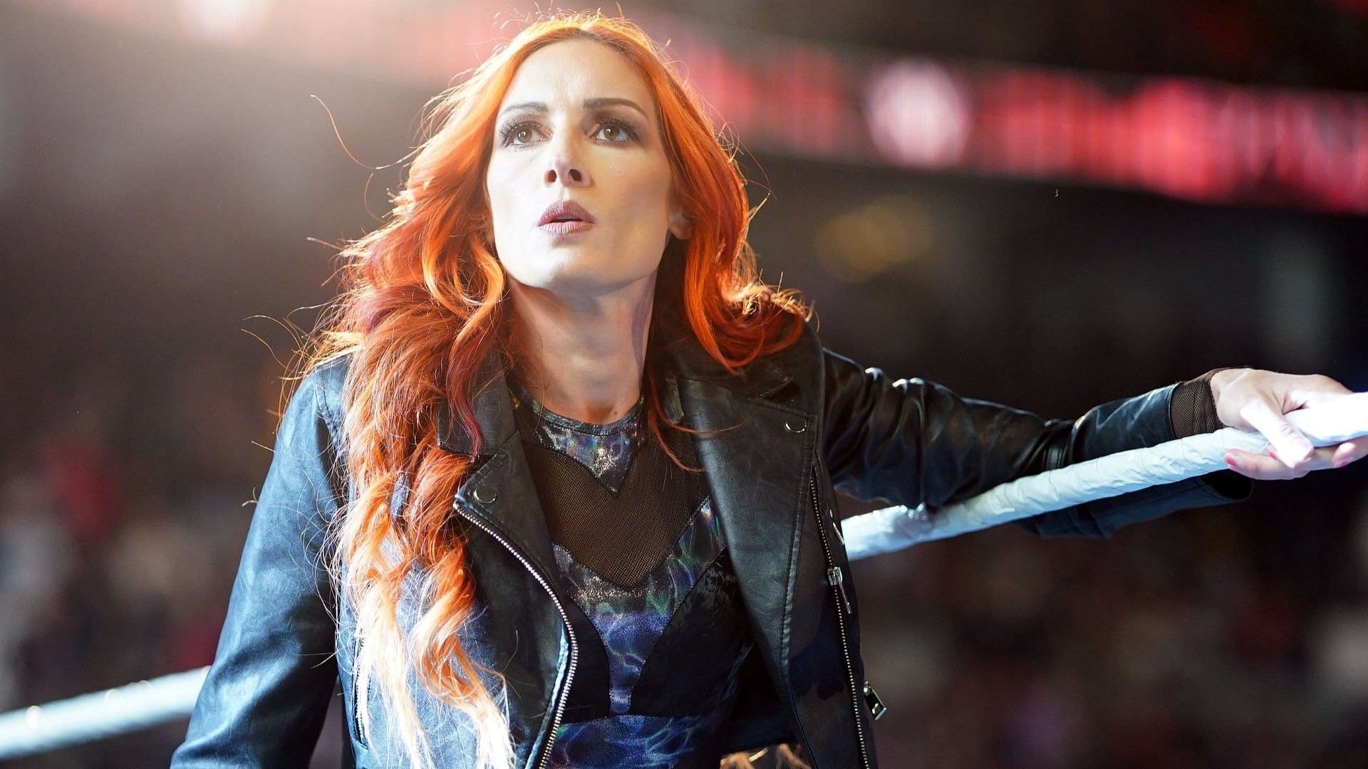 Becky Lynch looks on at the WWE RAW crowd