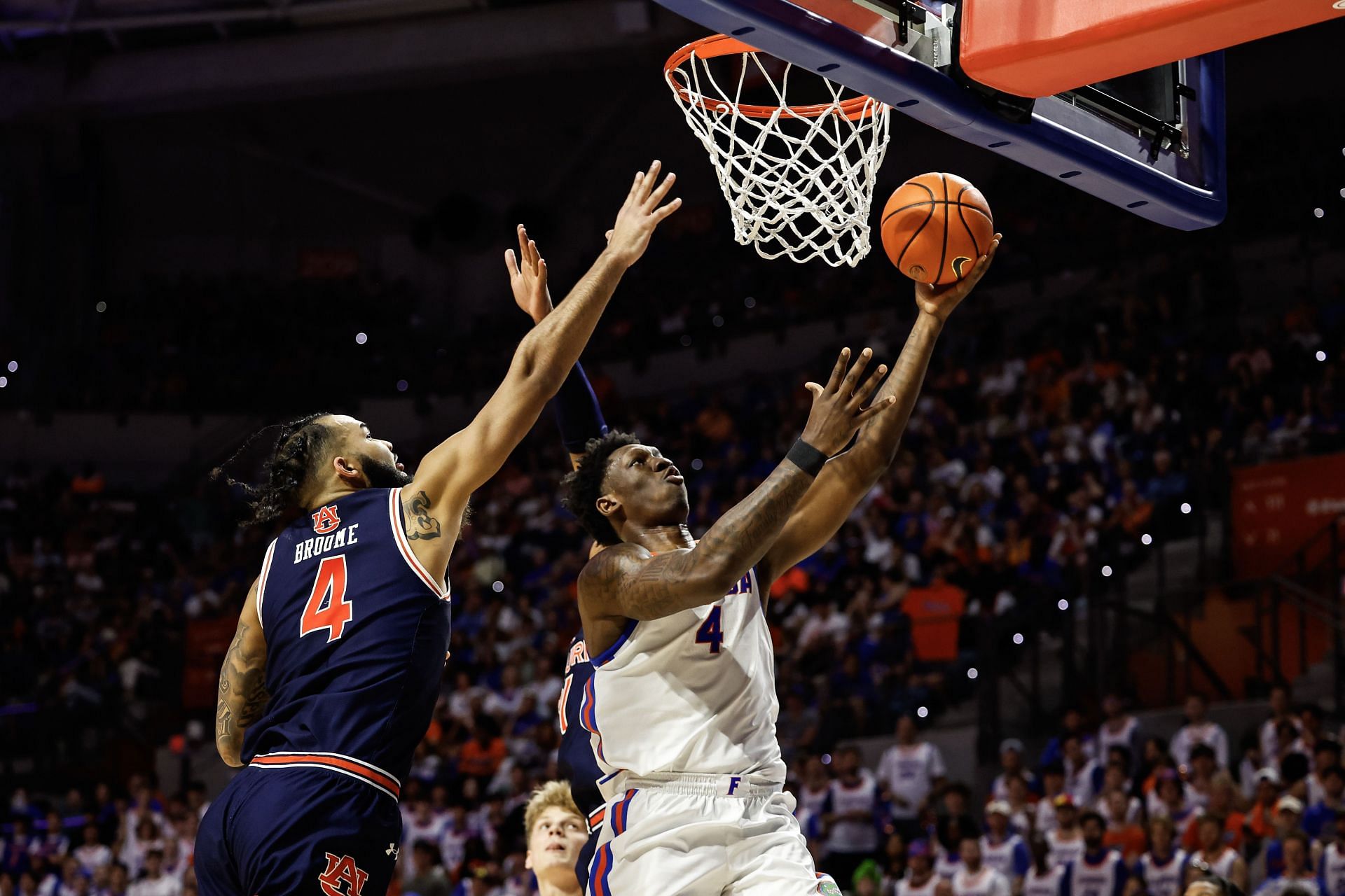 Tyrese Samuel #4 of the Florida Gators shoots the ball against Johni Broome #4 of the Auburn Tigers