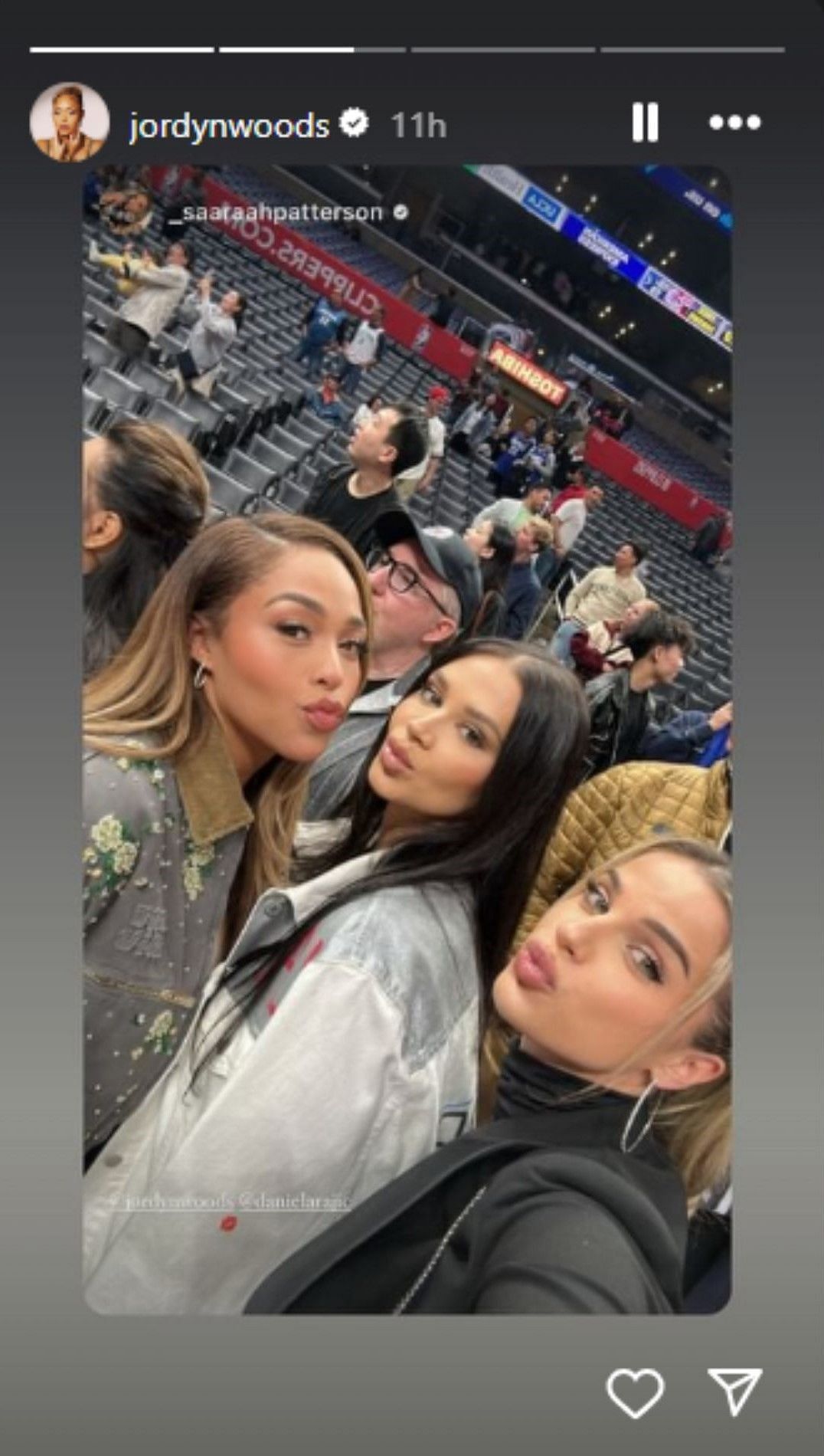 Jordyn Woods (left) snaps a photo with Daniela Rajic at the Minnesota Timberwolves-LA Clippers game on Tuesday.