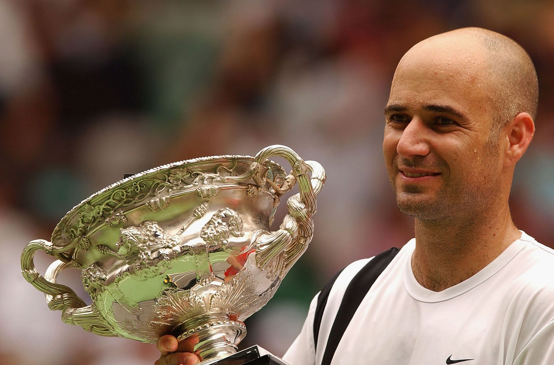 Andre Agassi with the 2003 Australian Open trophy