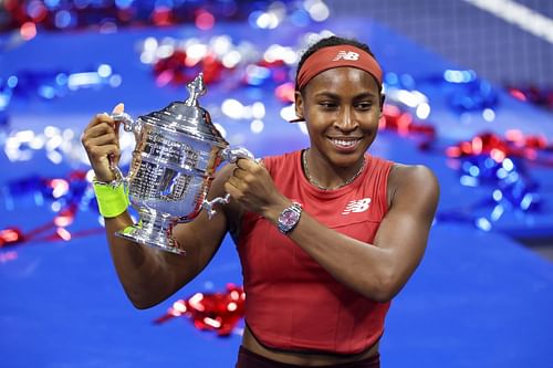 Coco Gauff poses with the US Open trophy