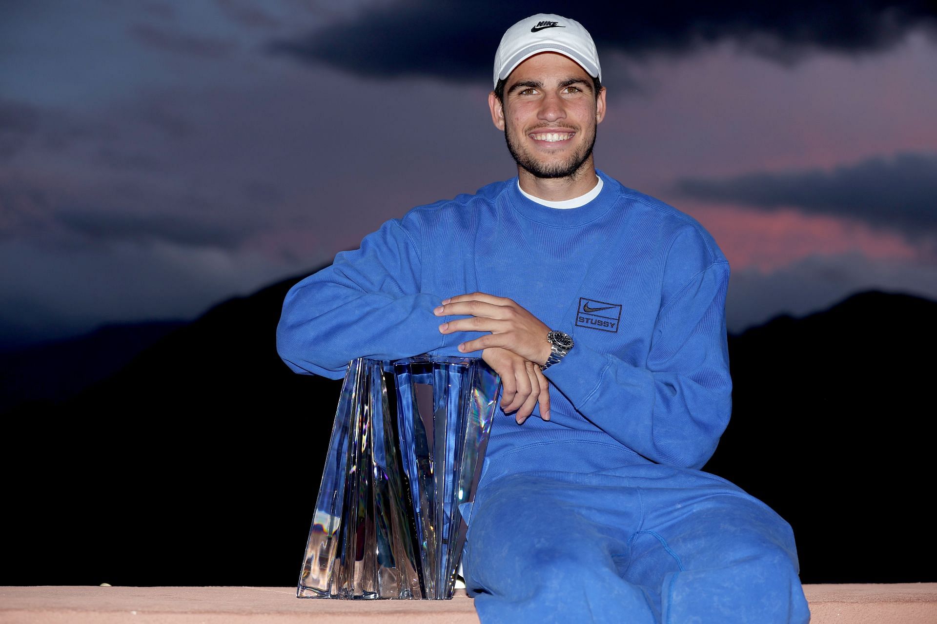 Carlos Alcaraz poses with the trophy after winning the Indian Wells tournament in 2023