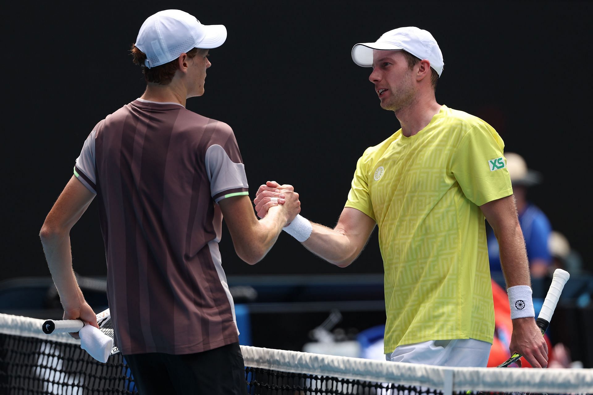 Jannik Sinner and Botic van de Zandschulp pictured at the 2024 Australian Open