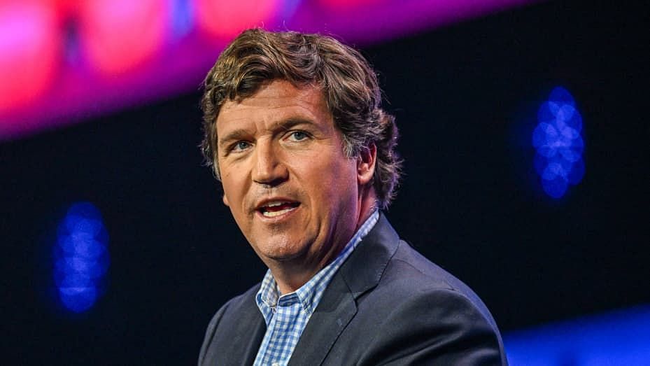 Tucker Carlson gets mocked online after recent Russian grocery store video goes viral. (Image via Tucker Carlson Network)