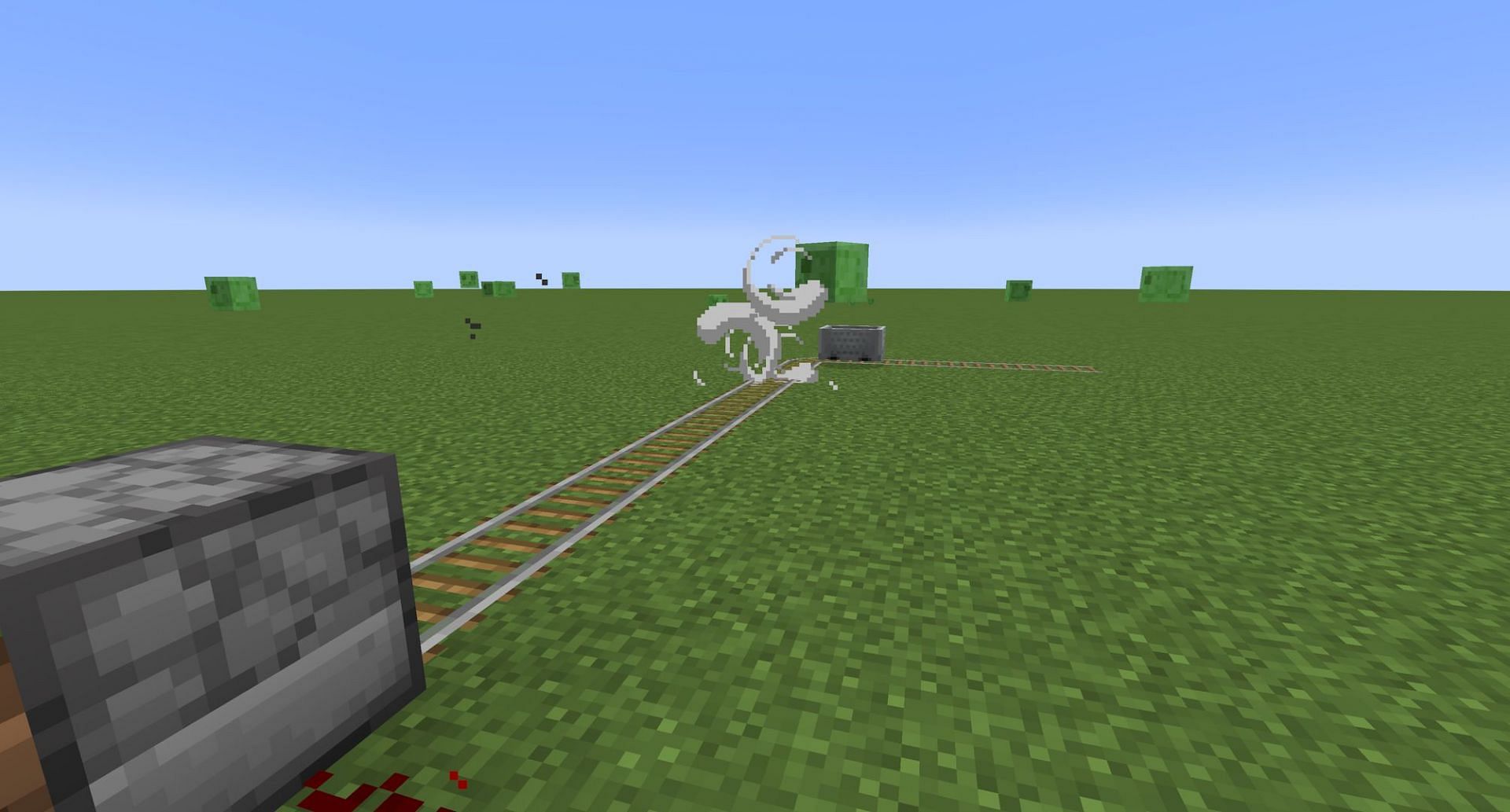 A minecart being pushed through a corner by a wind charge (Image via Mojang)