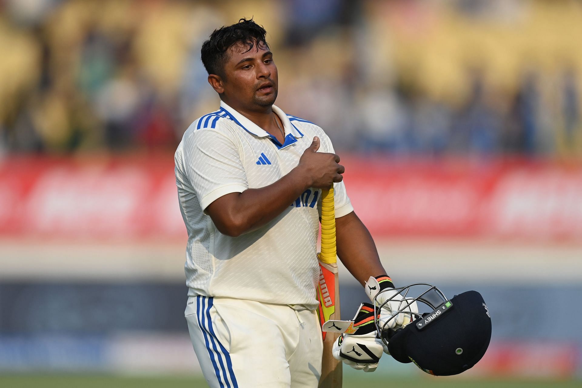 A dejected Sarfaraz Khan walks back after being run out in the Rajkot Test. (Pic: Getty Images)
