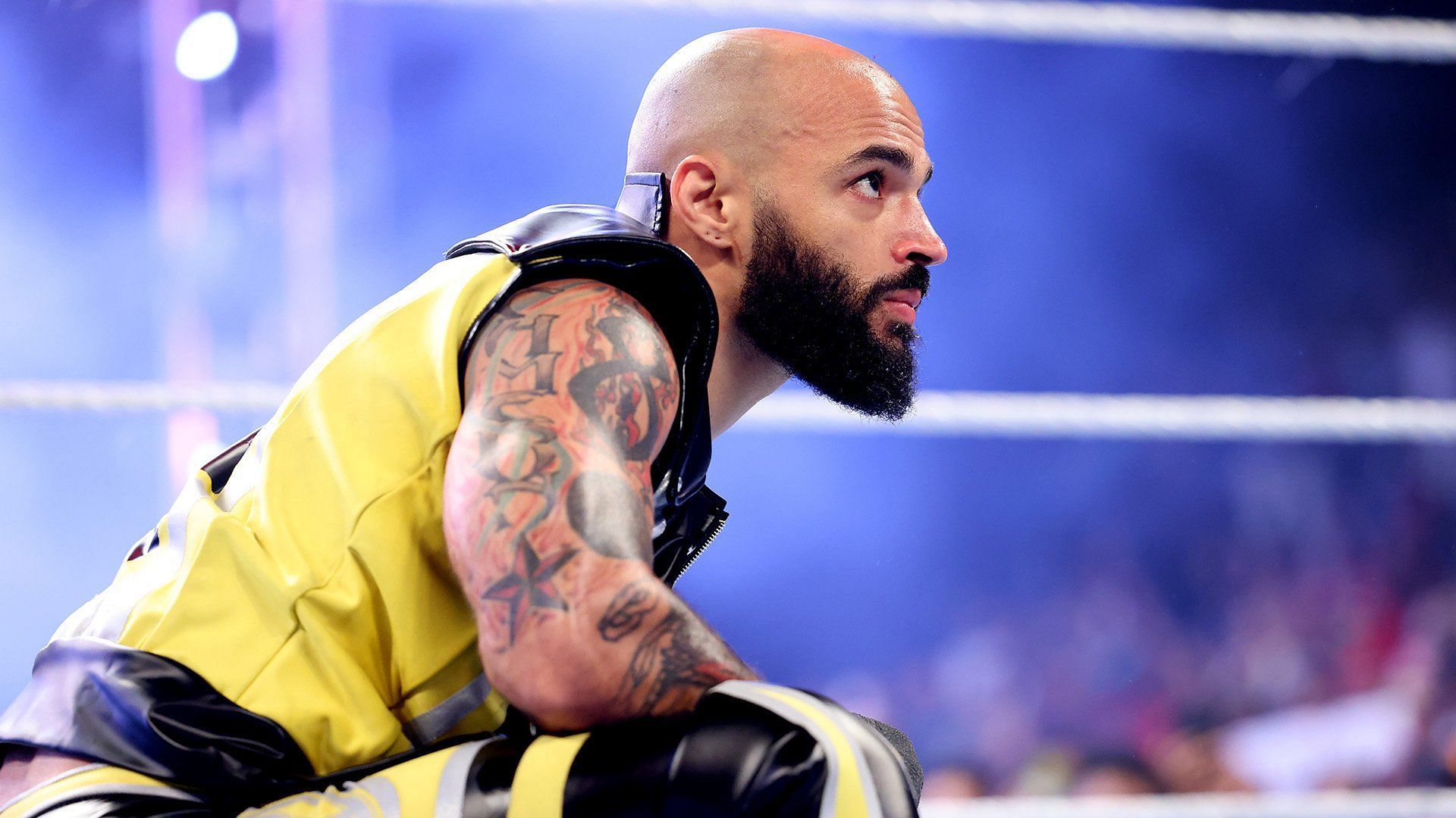 Ricochet looks on from the ring on WWE SmackDown
