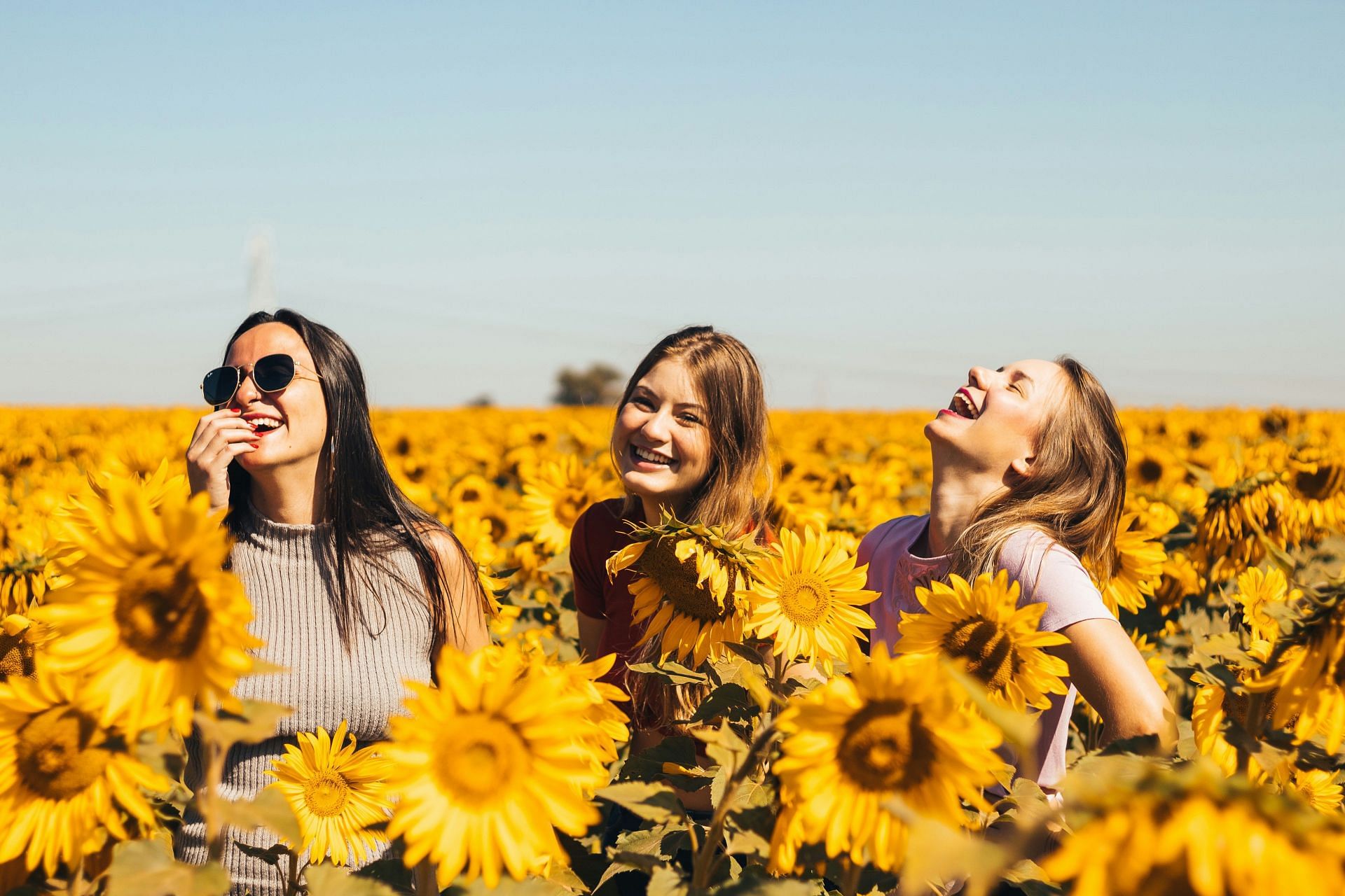 Positive psychology tools are meant to enhance happiness. (Image via Unsplash/ Antonino Visalli)