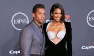 Denver Broncos QB Russell Wilson (L) with his wife Ciara