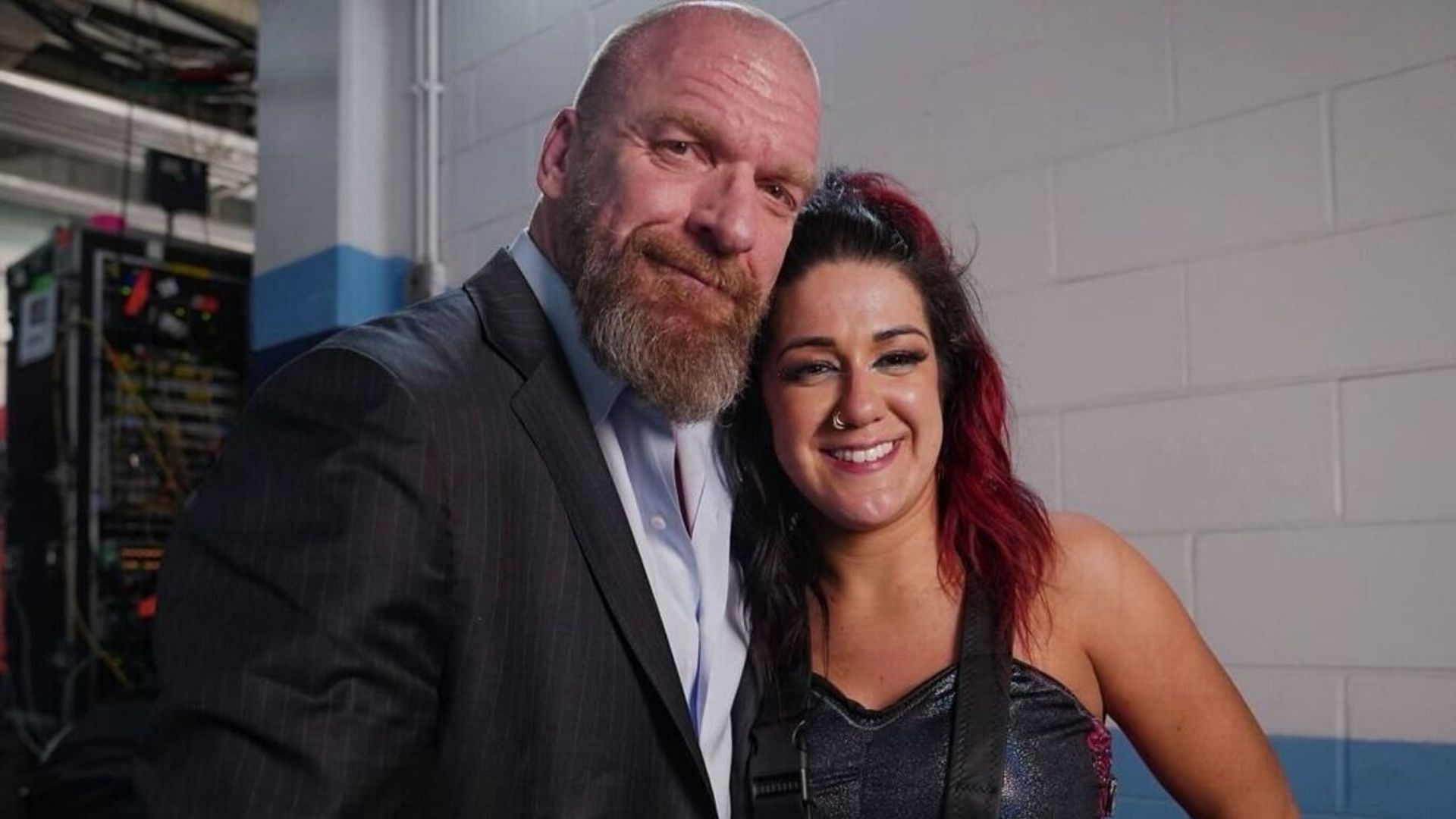 WWE CCO Triple H (left) and Bayley (right) 