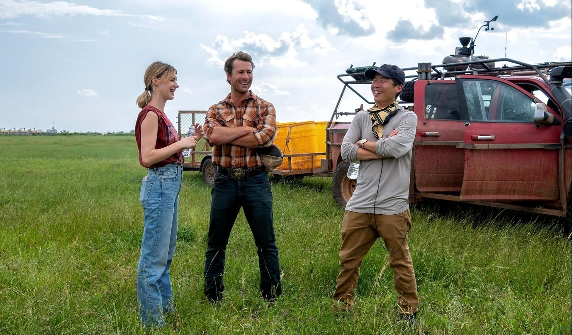 Glen Powell, Lee Isaac Chung, and Daisy Edgar-Jones in Twisters (Image via Universal)