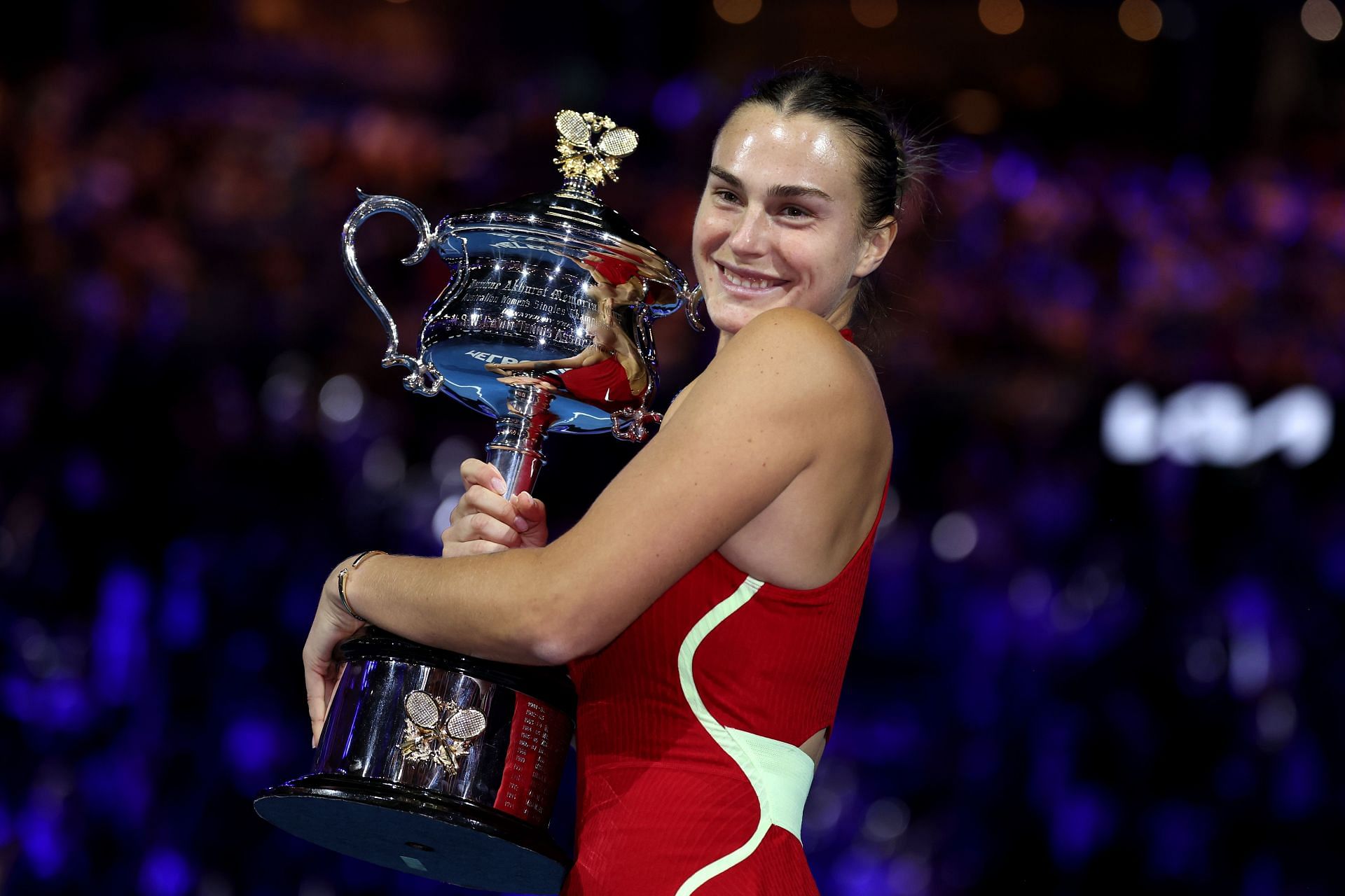 Aryna Sabalenka with the 2024 Australian Open trophy.