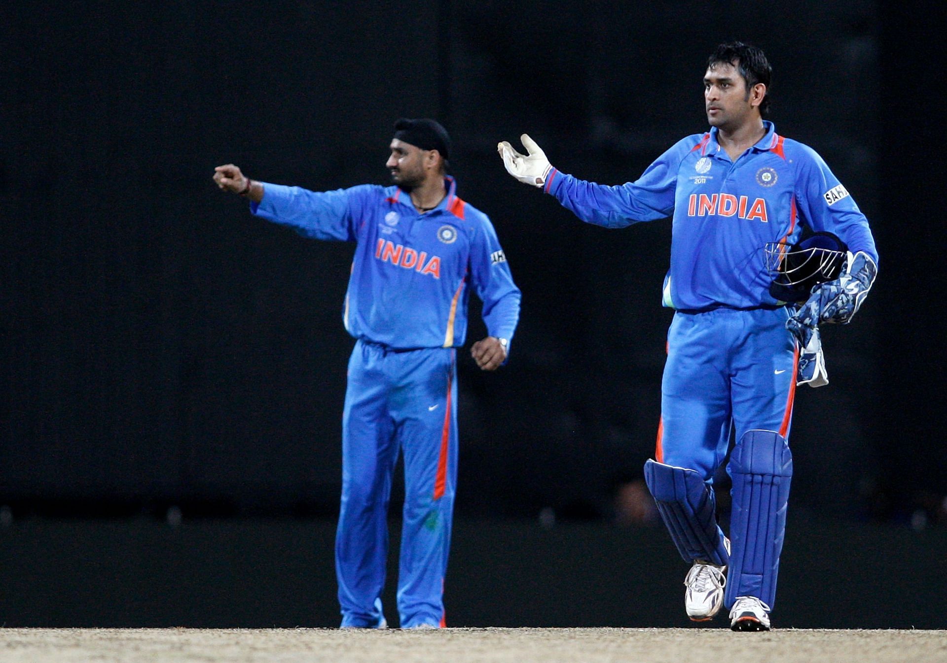 Harbhajan Singh (left) and MS Dhoni (Pic: Getty Images)