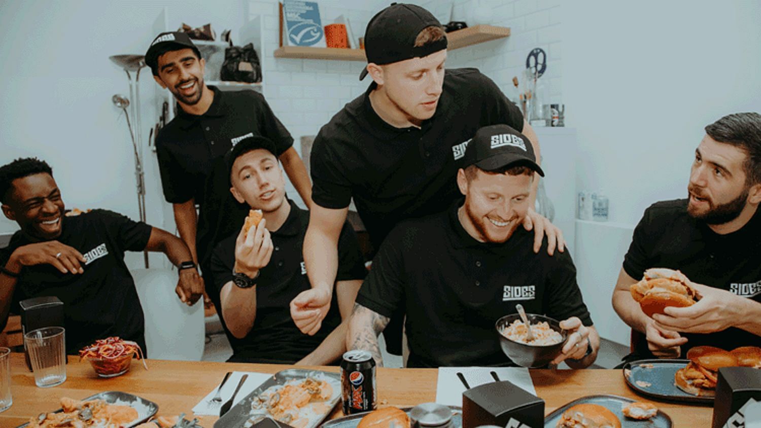 Vikram pictured with the rest of the Sidemen with their Sides food (Image via Restaurantonline.co.uk)