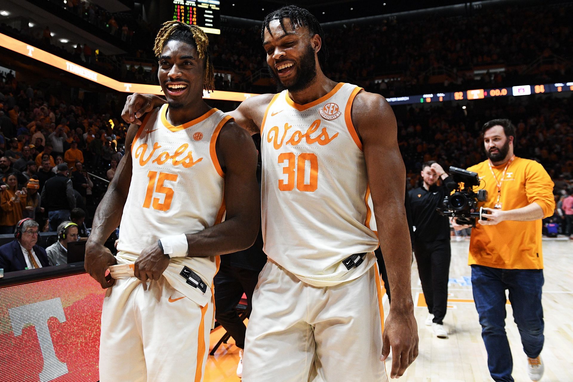 Jahmai Mashack #15 and Josiah-Jordan James #30 of the Tennessee Volunteers walk off the court following their win over the Auburn Tigers at Thompson-Boling Arena on February 28, 2024 in Knoxville, Tennessee.