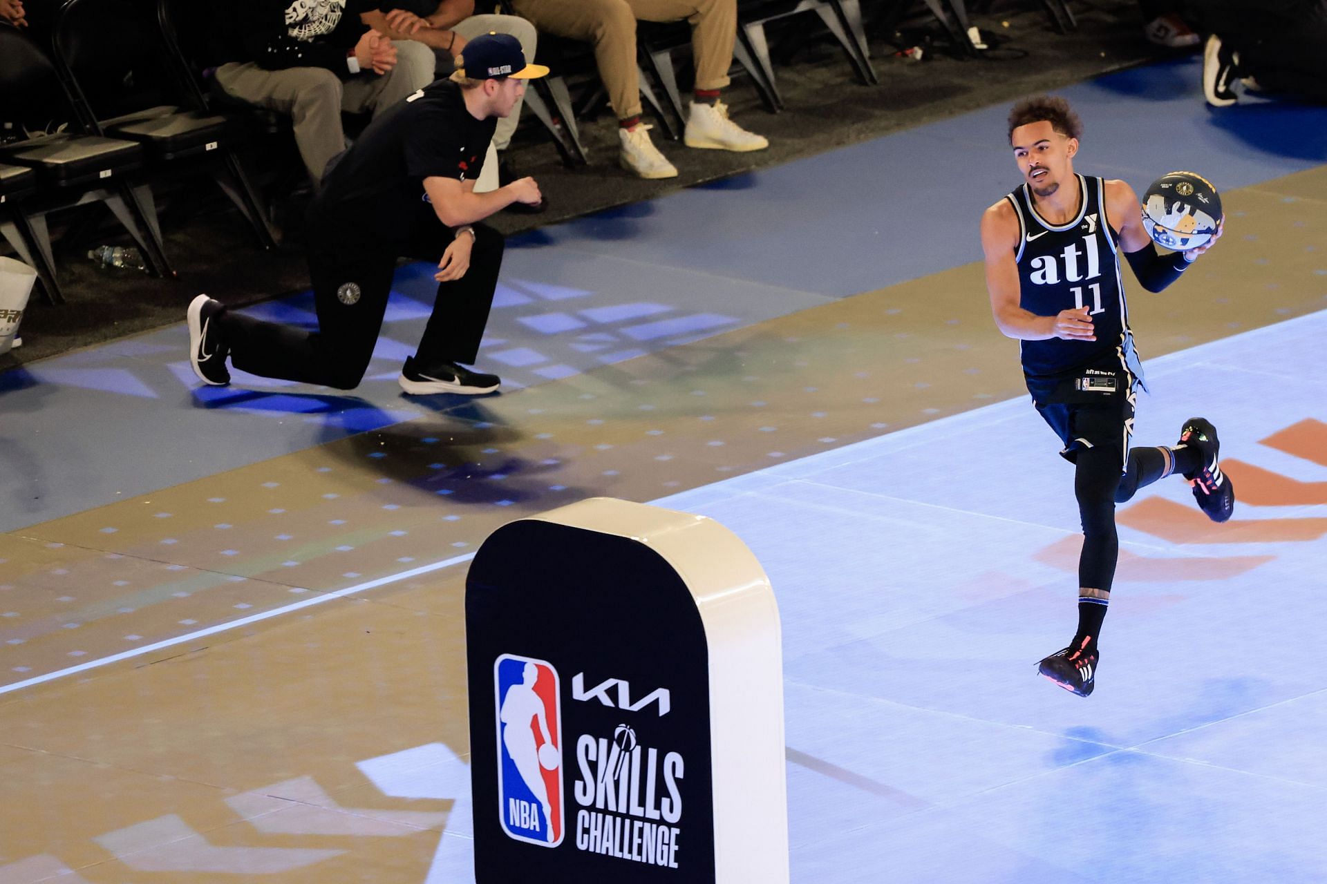 INDIANAPOLIS, INDIANA - FEBRUARY 17: Trae Young #11 of the Atlanta Hawks participates in the 2024 Kia Skills Challenge.