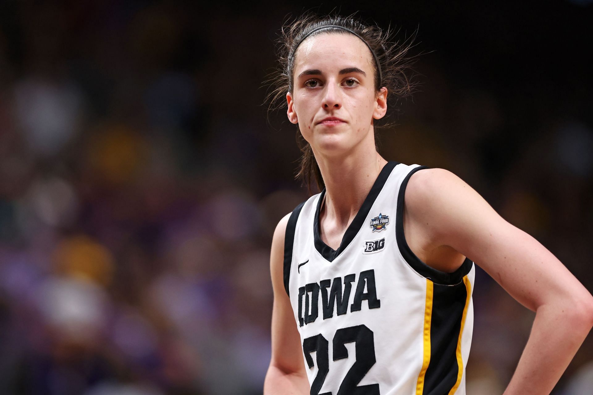 Caitlin Clark #22 of the Iowa Hawkeyes reacts during the first half against the LSU Lady Tigers during the 2023 NCAA Women&#039;s Basketball Tournament championship.