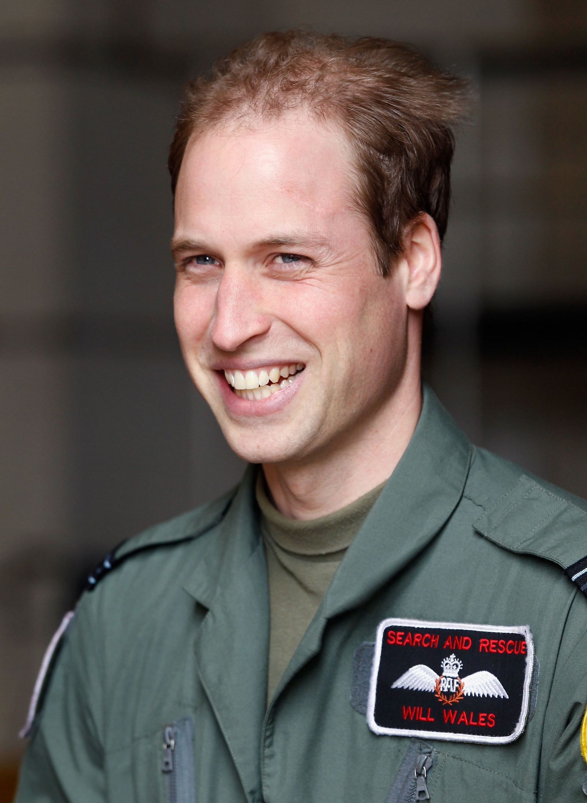 Prince William smiles as he waits for his grandmother, Queen Elizabeth II -  April 1, 2011 (Image via Getty)