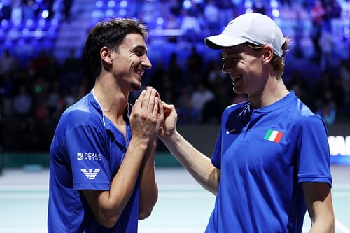 Lorenzo Sonego (L) and Jannik Sinner (R) at the 2023 Davis Cup Final