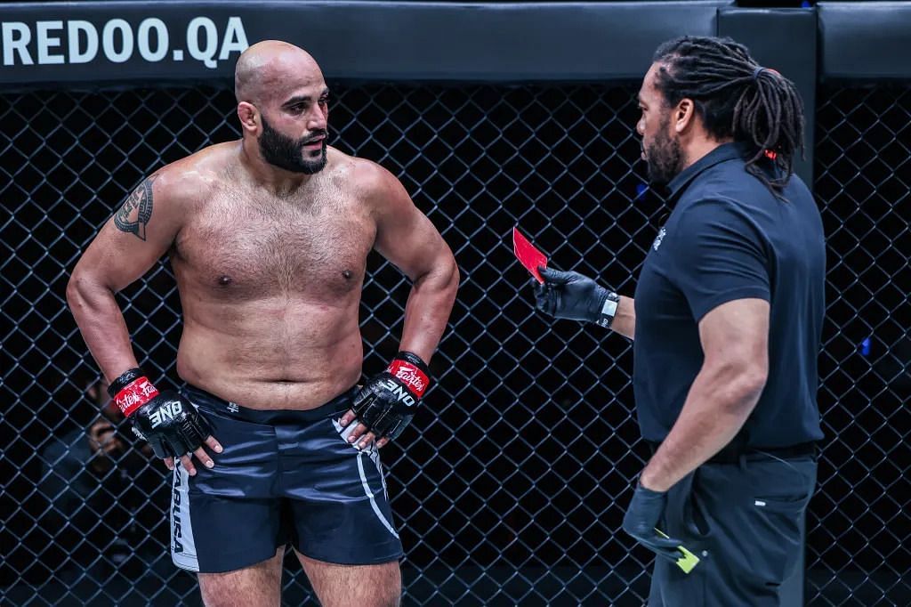 Arjan Bhullar is shown a red card by referee Herb Dean a ONE 166 in Qatar.