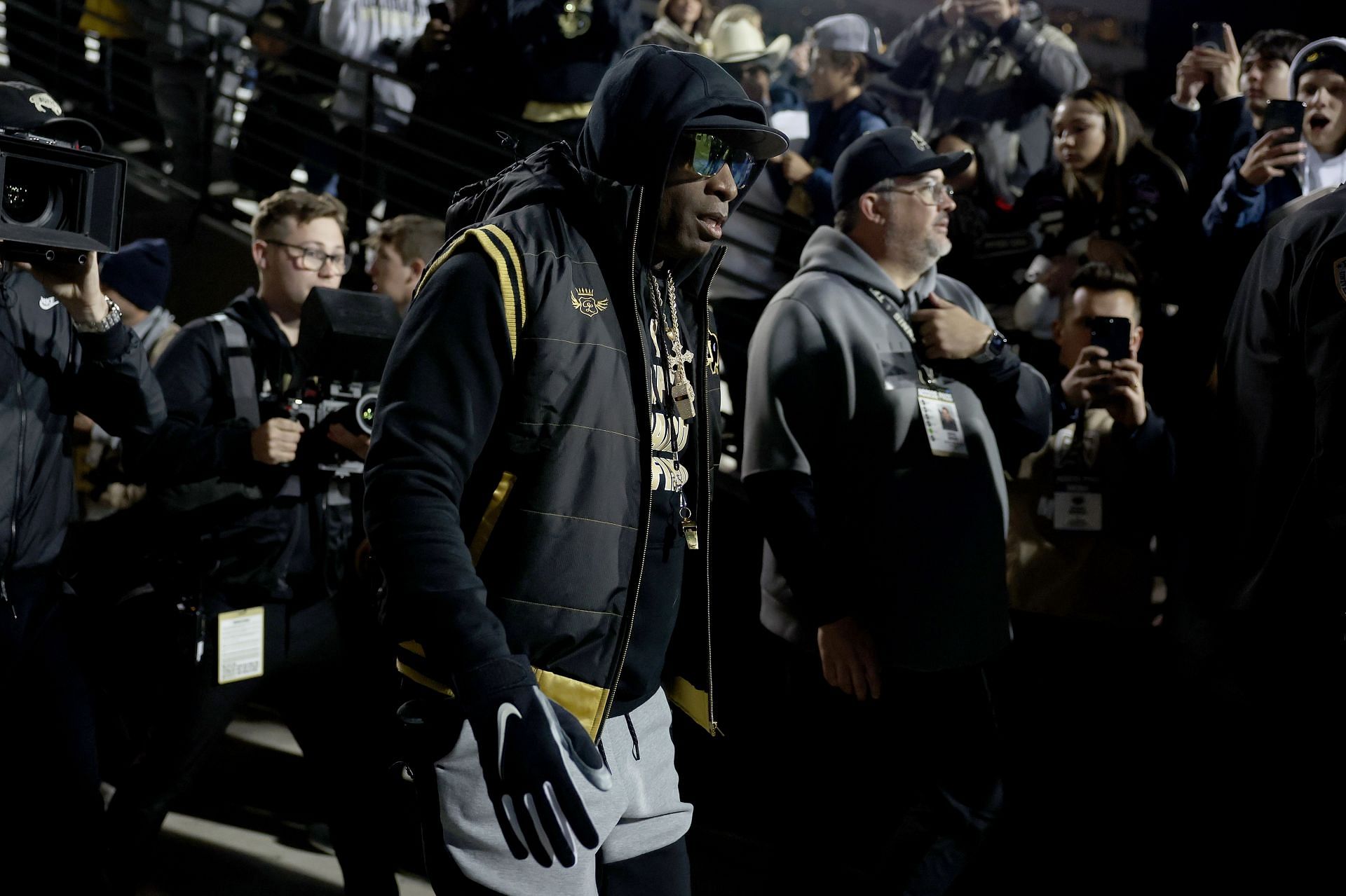 Head coach Deion Sanders of the Colorado Buffaloes takes the field.