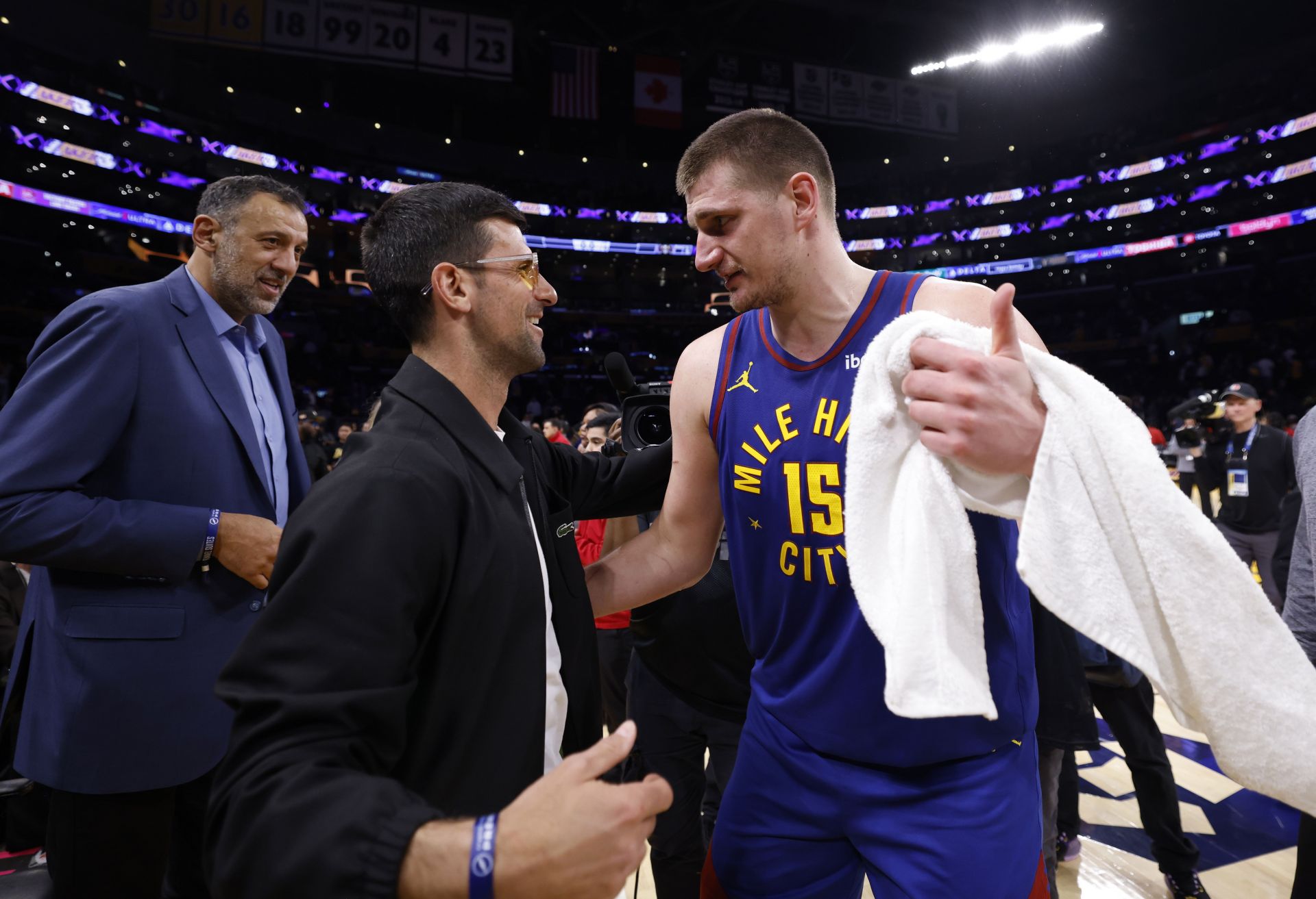 Novak Djokovic and Nikola Jokic at Denver Nuggets v Los Angeles Lakers match.